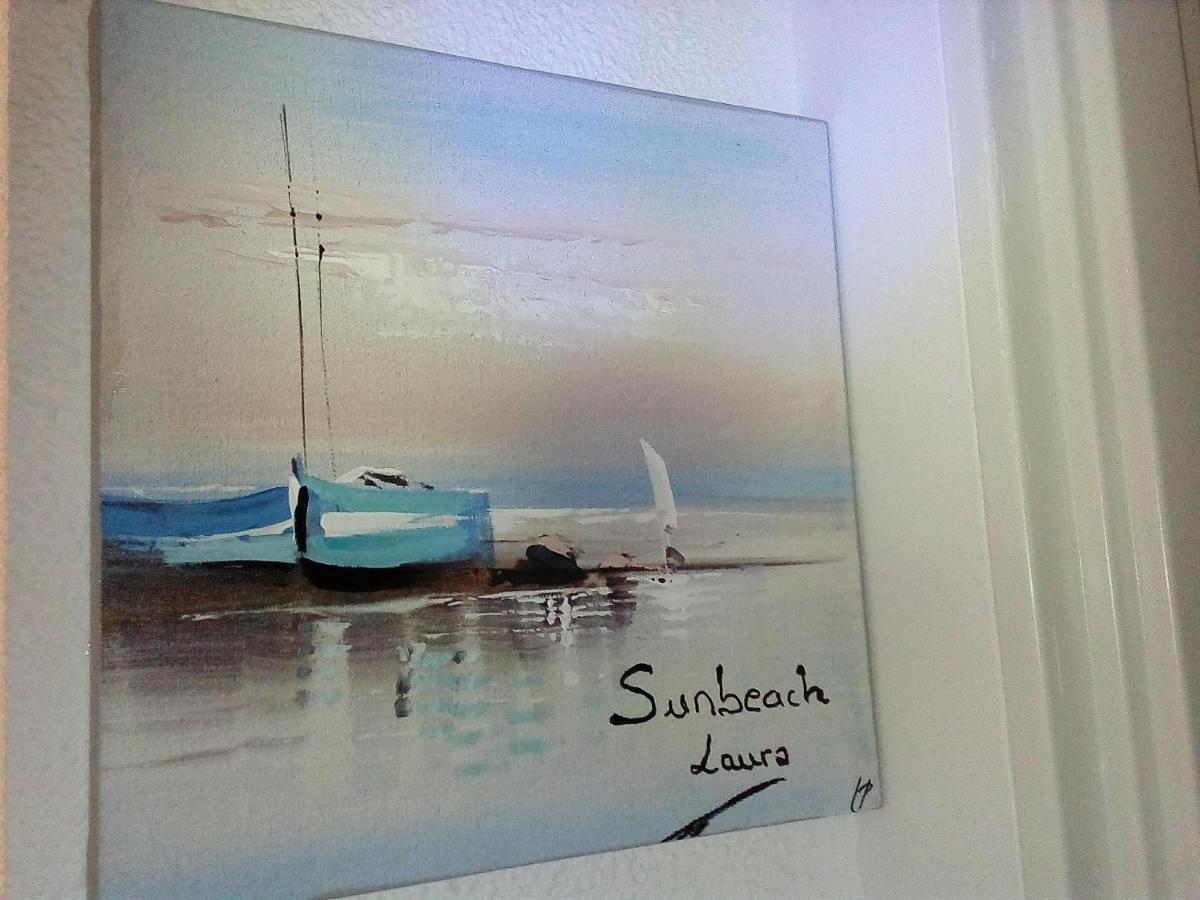 Laura Sunbeach *